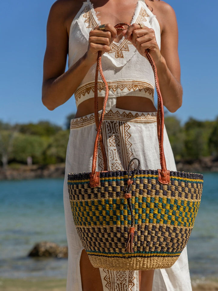 AFRICAN WOVEN BASKET IN YELLOW BLUE