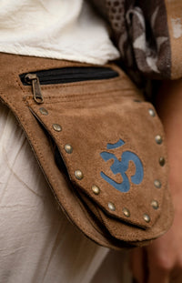 The Nile Recycled Leather Pocket Belt - Brown with Blue Om Symbol