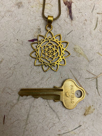 SEED OF LOVE PENDANT - BRASS