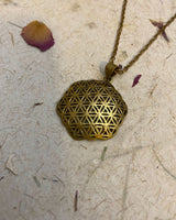 FLOWER OF LIFE CURVED PENDANT - BRASS