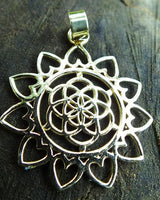SEED OF LOVE PENDANT - BRASS